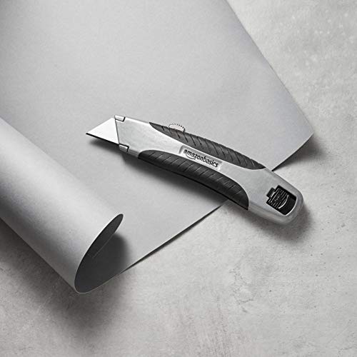 Amazon Basics Soft Grip Retractable Utility Knife with 3 Carbon Steel Blades, Quick Change Blade System, Black/Silver